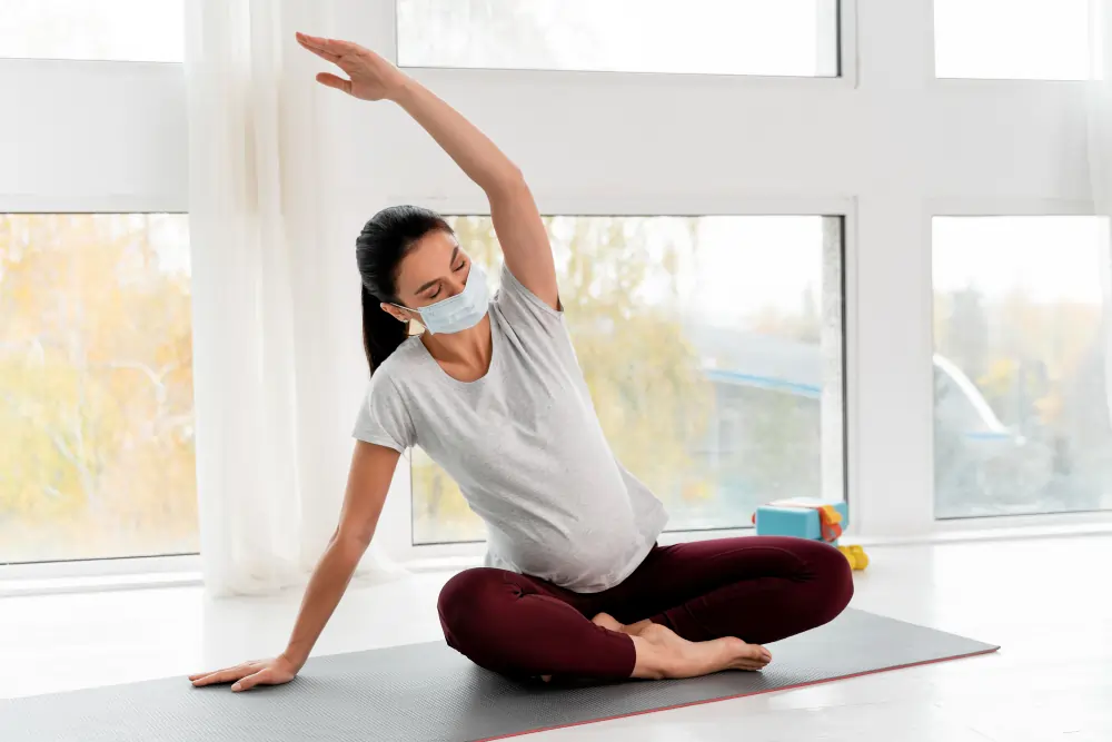 pregnant lady doing yoga